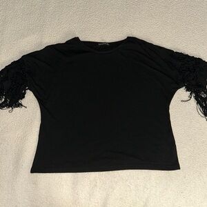 TOPSHOW blk woman’s top size large !!